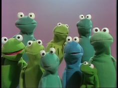 the muppets are posed in front of each other