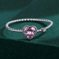 This Ring Is Made Of Sterling Silver And Has A Beautiful Heart-Shaped Pink Zircon Design. The Center Stone Is A Brilliant Cut Zircon, Which Is 5a Premium Grade Offering High Luster. * Main Stonezircon * Metal925, Sterling * Shape\Patternheart * Style Cute/Romantic Standard Ring Sizing, Mm Refers To The Finger’s Circumference: * Size 6 (55mm) * Size 7 (56mm) Care: To Maintain Their Original Luster, We Suggest Removing Them Before Swimming Or Exercising. Avoid Contact With Any Harsh Chemicals. We Silver Crystal Promise Ring For Valentine's Day, Silver Heart-shaped Crystal Promise Ring, Sterling Silver Heart Shaped Promise Ring, Valentine's Day Sterling Silver Crystal Ring, Valentine's Day Silver Sterling Crystal Ring, Sterling Silver Heart-shaped Crystal Promise Ring, Silver Heart Crystal Promise Ring, Silver Cubic Zirconia Heart Ring For Mother's Day, Heart-cut Sterling Silver Crystal Ring