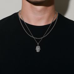 Our Silver and Gold Hamsa Pendant is made from Premium quality 316L stainless steel. This allows the pendant and chain to be water and sweat resistant. This chain can be worn on its own as a statement or be layered with other chains from our shop. -------------------------------------- ♛ DETAILS & MATERIALS ♛ -------------------------------------- ◈ Chain Length: 20.8 Inches ◈ Chain Width: 2.2 MM ◈ Chain Style: Curb chain ◈ Pendant Size: 25mm x 17mm x 1.9mm ◈ Chain Quality: 316L stainless steel Hamsa Necklace Men, Fatima Hand, Mens Necklace Pendant, Hamsa Charm, Gold Hamsa, Hamsa Pendant, Mens Necklace, Hamsa Necklace, Gold Rope Chains