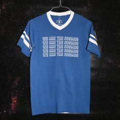 we are the cosmos tee Blue T-shirt With Letter Print For Fans, Blue Team Spirit Graphic T-shirt, Blue Team Spirit T-shirt With Graphic Print, Blue Team Spirit Graphic Print T-shirt, Blue Letter Print T-shirt For Fans, Retro Blue Tops With Letter Print, Retro Blue Top With Letter Print, Retro Blue T-shirt With Text Print, Blue Tri-blend T-shirt With Screen Print