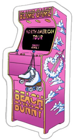 a pink arcade machine with an american tour sign on it's front and bottom