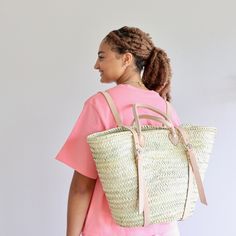 This gorgeously woven Daniela Large French Market Backpack in Natural is perfect for collecting finds from the farmer's market or art fair and toting it back home. Also lovely as a bag for beach day and everyday! Leather handles and adjustable leather strap. Daniela large french market backpack Natural color Measures approx. 21.25"H x 19.6"W x 11.8"D Handmade by skilled artisans in Morocco Everyday Summer Straw Backpack, Summer Everyday Straw Backpack, Straw Backpack With Braided Handles For Travel, Summer Beach Standard Backpack, Summer Vacation Standard Backpack, Summer Leather Handle Backpack, Bohemian Woven Leather Beach Bag, Daily Use Straw Backpack With Braided Handles, Natural Color Standard Backpack For Vacation