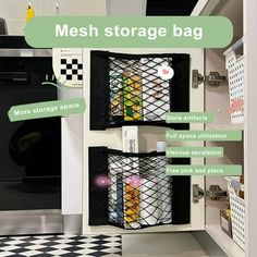 an organized kitchen with mesh storage bags on the wall and floor, in black and white checkered tile