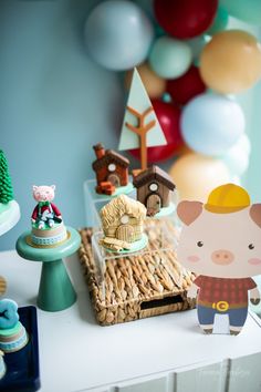 a table topped with lots of toys and decorations