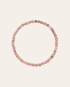 This 14K Gold Rhodochrosite Bracelet is segmented with 7 golden beads and textured pink stones, a combo that's sure to get hearts racing! This powerful combo is said stimulate love and passion while energizing the soul. Made in L.A. Stretch Fit Rhodochrosite Beads: Approx. 4mm Total Weight: Approx. 4g Ships in 6-9 business days Rush order ships in 3-5 business days Comes carefully packaged in a branded Zoe Lev protective sleeve. This item is Final Sale. See here for details. Rhodochrosite Bracelet, Pink Rhodochrosite, Golden Beads, Pink Stones, Jasper Bracelet, Pink Stone, Bead Bracelet, Text Color, Arm Band