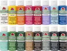 twelve different colors of acrylic paint