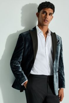 This textured slim fit velvet blazer features a geometric all-over pattern with contrasting black satin lapels, finished with a single-breasted button-fastened construction. Ideal for Christmas parties and formal dinners. Dry clean only. Main 62% Recycled polyester, 35% Viscose, 3% Polyester. Lining 100% Polyester. Outer 55% Nylon, 45% Viscose. Blazer For Party, Wrap Dress Wedding Guest, Layered T Shirt, Navy Blue Blazer, Denim Shirt Dress, Velvet Blazer, Christmas Parties, Fitted Blazer, Black Wrap Dress