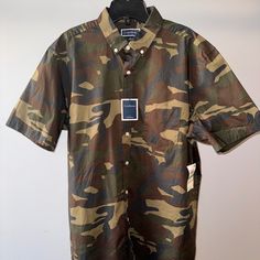 Nwt Graphic Camo Short Sleeve Button Down Club Room Shirt Khaki Short Sleeve Shirt With Button Closure, Short Sleeve Khaki Shirt With Buttons, Brown Button-up Camp Shirt, Khaki Button-up Shirt With Button Closure, Khaki Short Sleeve Shirt With Buttons, Khaki Snap Buttons Button-up Shirt, Khaki Military Short Sleeve Shirt, Khaki Short Sleeve Military Shirt, Casual Brown Camp Shirt With Button Closure