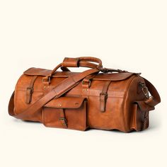 Vintage Buffalo Leather Full grain travel Duffle Brown Leather-backed Bags For Adventure, Brown Waxed Adventure Bags, Brown Adventure Bag With Waxed Finish, Brown Waxed Finish Bag For Adventure, Brown Bags With Leather Backing For Adventure, Brown Waxed Finish Bags For Adventure, Rugged Leather Bags For Outdoor, Travel Brown Saddle Bag With Leather Backing, Outdoor Leather-lined Satchel Bag