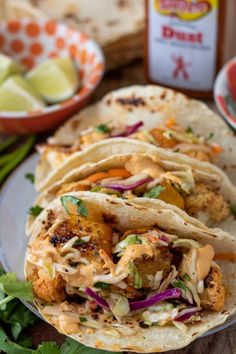 chicken tacos with cole slaw and cilantro sauce