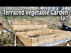 three wooden raised garden beds with gardening tools in the background and text overlay that reads terraced vegetable garden ep 1