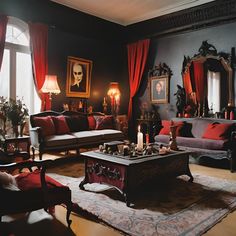 a living room filled with lots of furniture and red drapes on the windowsill