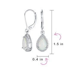 Hey sexy lady, elevate your look with glamorous Created Opal earrings. Perfect for that sassy cocktail dress, these sterling silver dangling earrings feature hand-selected oval Created Opals surrounded by shimmering CZs. Add sophistication, class, and glamour to your evening outfits. Get yours before your next night out! Opal Drop Earrings, Opal Pendant Necklace, October Birthday, Silver Jewellery Sets, Evening Outfits, Dangling Earrings, Opal Earrings, Oval Pendant, Opal Pendants