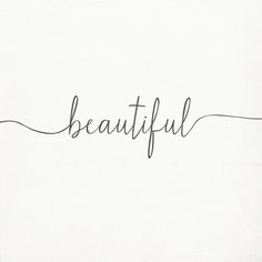 the word beautiful written in cursive handwriting