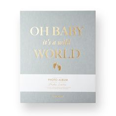 the baby it's a wild world photo album with gold foil lettering on grey paper