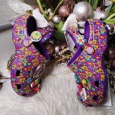 Crocs Unisex-Adult Classic Lisa Frank Clogs Women8/Mens6 Women9/Mens7 Women10/Mens8 Women11/Mens9 Color: Neon Purple/Multi Lisa Frank Crocs: These Limited-Edition Lisa Frank X Crocs Clogs Are Decked Out In Signature Lisa Frank Designs And Includes A Whimsical And Wonderful Collection Jibbitz Charms. Lightweight And Fun: The Crocs For Men And Women Feature Lightweight Iconic Crocs Comfort. Ventilation Ports Add Breathability And Help Shed Water And Debris Quickly. What Size Should I Buy?: These M Spring Purple Synthetic Clogs, Multicolor Synthetic Clogs With Rubber Sole, Purple Synthetic Clogs, Multicolor Closed Toe Synthetic Clogs, Multicolor Clogs With Cushioned Footbed, Multicolor Cushioned Round Toe Clogs, Multicolor Round Toe Clogs With Cushioned Footbed, Non-slip Multicolor Closed Toe Clogs, Multicolor Non-slip Closed Toe Clogs