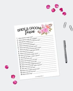 the bride and groom trivia game is surrounded by rose petals, pens, and paper clips