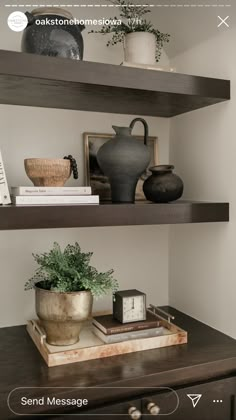 the shelves are filled with vases, books and other decorative items on top of them