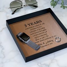 This 3 year Anniversary gift is a perfect gift for leather anniversary and can be customized with any wording. The sample picture is 3 years countdown to celebrate this milestone together and you can easily customize it with your names and special date. Or use your own wording. Wedding vows, first dance song lyrics, a poem. The genuine leather placed in a black metal tray enhances the overall elegance and sentiment of this special gift. Leather is strong, flexible, durable, warm and above all, r Leather Anniversary Gift Ideas, 3 Year Anniversary Gift Ideas For Him, 3rd Year Anniversary Gifts For Him, 3rd Year Anniversary Gifts, 3 Year Anniversary, Anniversary Gift Ideas, Leather Anniversary Gift, Leather Anniversary, Leather Tray