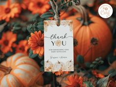 a thank you card with flowers and pumpkins in the background