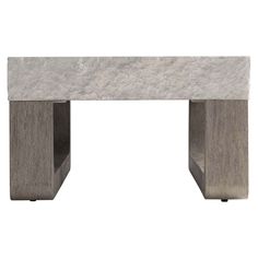 a white marble top and metal base coffee table with an open shelf on one side