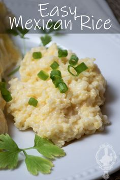 an easy mexican rice dish on a white plate with green garnish and parsley