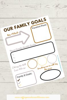 a family goal sheet with the words our family goals on it and an arrow pointing up to