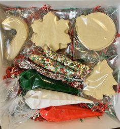 an assortment of cookies and candy in a box