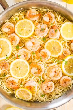 a pan filled with shrimp and lemon pasta