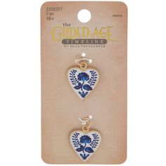 Explore the world of exciting pendants and charms! Blue & White Floral Heart Charms have a heart shape with an antique floral print on the front. The print shows an image of a flower with narrow stems on either side. Incorporate these charms into your next jewelry or craft project! Details: 	 Dimensions: 0.8" x 0.71" 	 Material: Metal 	 Color: White & Blue 	 Metal Color: Gold 	 Quantity: 2 Heart-shaped Flower Charm For Jewelry Making, Vintage Jewelry With Flower Charm For Valentine's Day, Vintage Flower Charm Jewelry For Valentine's Day, Vintage Heart Earrings As Gift, Vintage Blue Jewelry With Flower Charm, Blue Charm, Clay Stuff, Jewelry Charms Pendants, Antique Floral