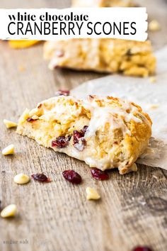 white chocolate cranberry scones on a wooden table