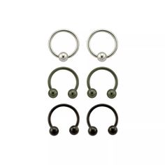 four pairs of black and silver nose rings with two balls on each end, one is round