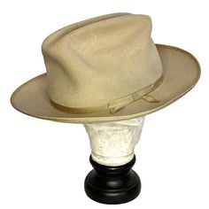 Vintage Resistol Beige XX long oval self confirming hat. Good/fair condition, light general wear, some light discoloration here and there, a few tiny dings, priced according and still very presentable - see photo they are part of description. Size 21.5" circumference Very nice quality. Great look for men or women! Classic Top Hat With Flat Bill For Rodeo, Classic Flat Bill Hat For Rodeo, Classic Cream Hats With Short Brim, Vintage Adjustable Fedora, Vintage Adjustable Fedora In Solid Color, Vintage Adjustable Solid Fedora, Classic Cream Brimmed Hats, Classic Flat Bill Fedora For Rodeo, Classic Beige Top Hat With Curved Brim