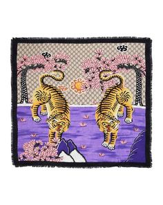 two tigers walking across a purple field with flowers and trees in the background on a multicolored scarf