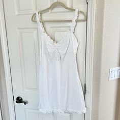 White Betsey Johnson X Urban Outfitters White Mini Dress With Details. Gently Washed Once But Never Worn. White V-neck Mini Dress By Urban Outfitters, White Ruffled Mini Dress From Urban Outfitters, Urban Outfitters Mini Dress With Ruffles For Daywear, White Mini Dress With Lace Trim For Daywear, White Lace Trim Mini Dress For Daywear, White Sundress By Urban Outfitters, Urban Outfitters White Sundress, White Urban Outfitters Sundress, White Urban Outfitters Dress For Vacation