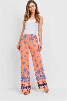 Stretch waistband floral print wide leg pants. Vacation Floral Print Wide-leg Pants, Floral Print Wide-leg Pants For Vacation, Vacation Floral Print Wide Leg Pants, Vacation Bottoms With Floral Print And Straight Leg, Floral Print Wide Leg Beach Pants, Floral Print Straight Leg Vacation Bottoms, Floral Print Straight Leg Bottoms For Vacation, High-waisted Floral Print Lounge Pants, High-waisted Floral Print Loungewear Pants