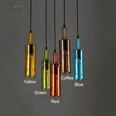 four different colored lights hanging from the ceiling