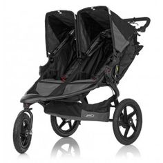 the double stroller is black and has two seats on each side, with wheels that are