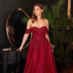 The Magnificent Dress Made In A-Line Silhouette Has A Structural Corset Decorated With Exquisite Lace, Which Together With Sparkling Sequins Create A Magical Image. A Floor-Length Skirt Made Of Lightweight Tulle Will Create A Romantic Look. Fabric: Tulle Length: Long Colour: Burgundy Neckline: Off Shoulder Silhouette: A-Line Sleeve: Sleeveless Back: Semi-Open, Zipper Skirt: Layered Embellishments: Sequins, Lace Occasion: Romantic Date/Evening/Dinner, Wedding/Bridesmaid, Graduation, Fashion Show, Dark Red Floral Dress, Red A-line Tulle Dress, Red Tulle Dress For Gala, Burgundy Dresses With Sweetheart Neckline And Fitted Bodice, Sleeveless Red Tulle Dress, Red Sleeveless Tulle Dress, Burgundy Sleeveless Dress With Fitted Bodice, Burgundy Evening Dress With Fitted Bodice For Gala, Red Gown With Sweetheart Neckline For Gala