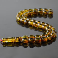 This is a wonderful Baltic amber rosary which is designed for Muslims. Amber is pressed but natural. Extruded means that the amber is made of fine amber dust and combined into one whole. From the pieces you will not even notice that they are made of pressed amber because of the very high quality. Pressed amber is very suitable for those who want to have the highest quality at a low price. We also supply wholesale rosaries, so you can be sure that we are not only manufacturers of unit products bu Baltic Amber, Rosary, Lithuania, Amber, Take That, Charms, Beads, Etsy Uk, 10 Things