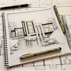 a pencil drawing of a house on top of blueprints