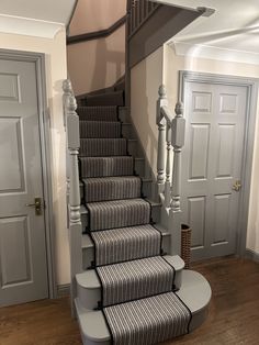 the stairs in this house are painted gray