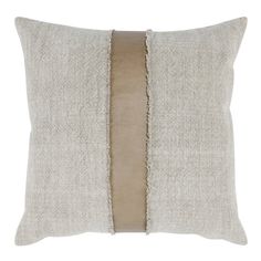 a white pillow with a beige stripe down the side