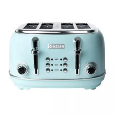 a blue toaster sitting on top of a white counter next to two black knobs