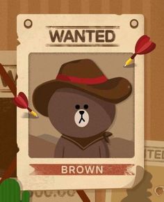 a brown teddy bear wearing a cowboy hat and holding a red arrow in its mouth