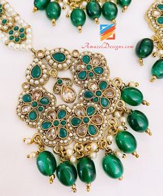 Polki Green Emerald Earrings Tikka Set. Available to shop online and delivered to your doorsteps anywhere in the world with our Everything-Everywhere FREE Shipping. 📦Unmatched FREE Worldwide Shipping EXPLORE more Maang Tikka Sets and Tikka Set Punjabi, INDIAN JEWELRY SETS Match with our pretty Single Line Necklaces Preet, Canada ⭐️⭐️⭐️⭐️⭐️ The payal I ordered was amazing 🤗 I got it in 3-4 days in a beautiful box with thank you note. Such an amazing experience with amazel designs. Thank you Kir Green Round Chandelier Earrings As Gift, Green Round Chandelier Earrings For Gift, Green Chandelier Earrings For Festivals And Gifts, Festive Green Hand Set Tikka, Hand-set Green Bridal Earrings For Festivals, Green Kundan Tikka For Celebration, Celebration Green Kundan Tikka, Traditional Green Plug Earrings For Gift, Traditional Green Plug Earrings As Gift