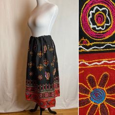 "This has a lot of charm! A very black, somewhat heavy cotton peasant style skirt with embroidery all around. Some of which includes little rooster/ chicken figures. It's very vibrant & colorful. In excellent condition. Seems unworn and or very original. Semi structured weighted cotton.  I feel the size is somewhat open, small to a medium. Please check measurements below.  It's in great shape.  ✏️ ✏️✏️DETAILS ✏️✏️✏️ Brand: hand made/ none Size on tag:- Fits like: Small to medium  Color:  black w Embroidered Long Black Skirt, Embroidered Black Long Skirt, Black Embroidered Long Skirt, Long Embroidered Cotton Skirt, Black Cotton Skirt With Floral Embroidery, Black Cotton Bohemian Skirt, Traditional Embroidered Black Skirt, Black Bohemian Cotton Skirt, Traditional Black Embroidered Skirt