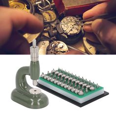 a person is working on an old watch with some screwdrivers and other tools