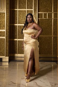 Slay this season in our one-shoulder cupro satin dress! This timeless gold dress is sustainable, plus-size friendly, and perfect for every shape and size. Show off your unique style and confidence with this stunning pieceDetails Neckline: One Shoulder Material: Cupro satin Lining: Viscose blend Made in India SustainabilityThis outfit is made with cupro satin, the fabric is made from cotton linter waste. It is a sustainable alternative to polyester Gold Strapless Satin Dress, Gold Satin Dress For Gala, Glamorous Gold Slip Dress For Formal Occasions, Glamorous Gold Slip Dress For Formal Events, Gold Satin Slip Dress For Night Out, Gold Satin Dress With Satin Finish, Gold One-shoulder Maxi Dress, Gold One-shoulder Evening Maxi Dress, Gold One-shoulder Maxi Dress For Evening