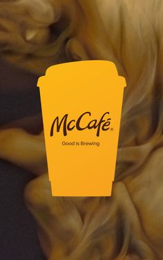 a coffee cup with the words mccaf on it